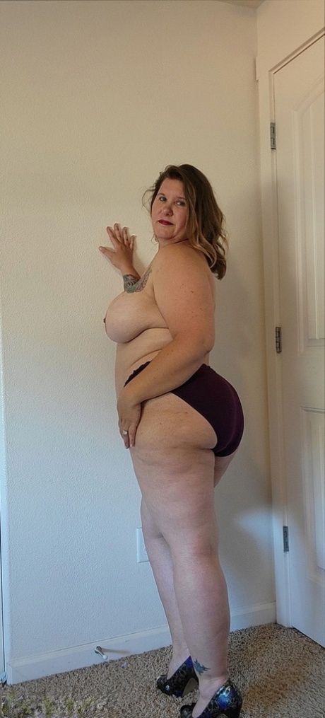 Obese Amateur Busty Kris Ann Strips Down To Her High-heeled Shoes