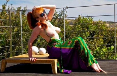 Redheaded British Model Gets Bare Naked On A Balcony In Sunglasses
