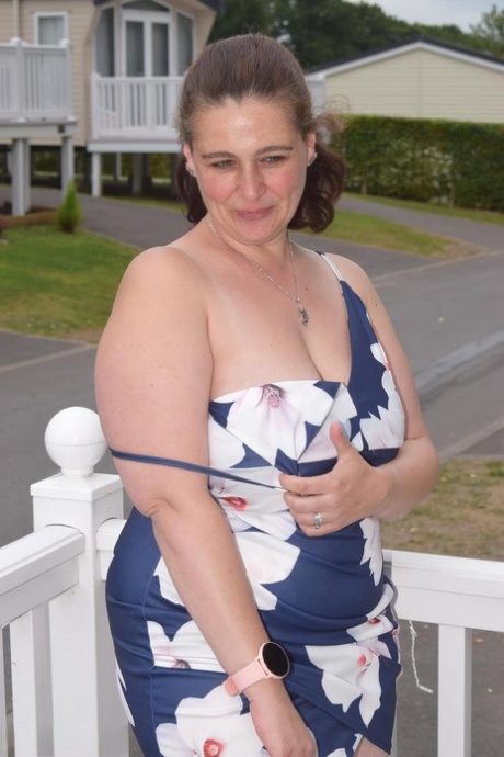 Middle-aged Fatty Exposes Herself On A Balcony In A Public Location