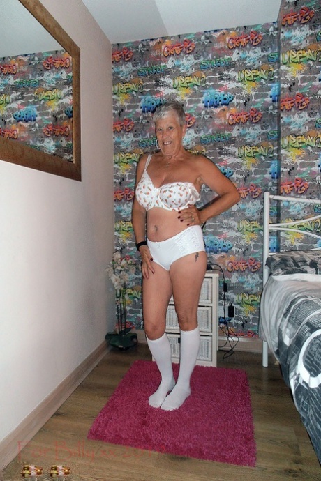 Her bedroom is where the granny with silver hair reaches down to her knees and wears white socks.