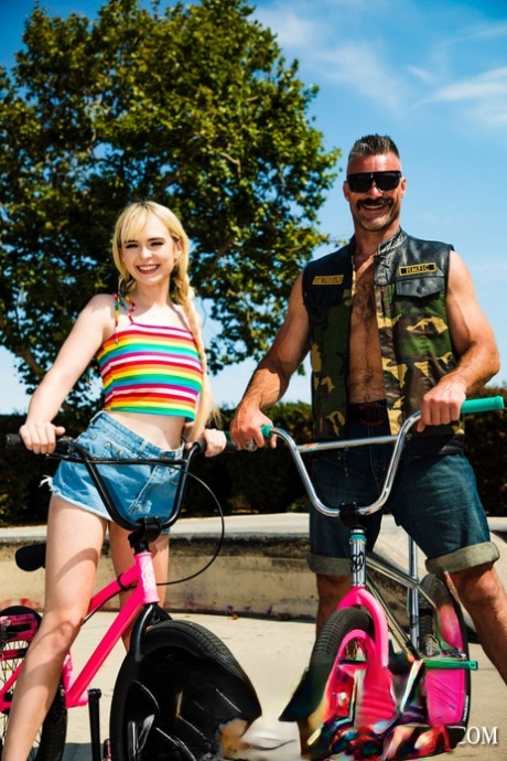 Young blonde Lilly Bell and her older boyfriend bicycle before they fuck