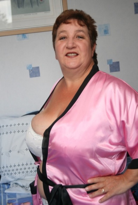 Mature Fatty Kinky Carol Looses Her Huge Breasts From A Satin Robe And Bra
