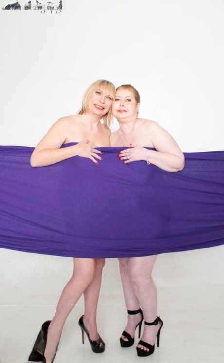 An overweight amateur model of Sophia and her undressed girlfriend are wrapped in a stretch of cloth.