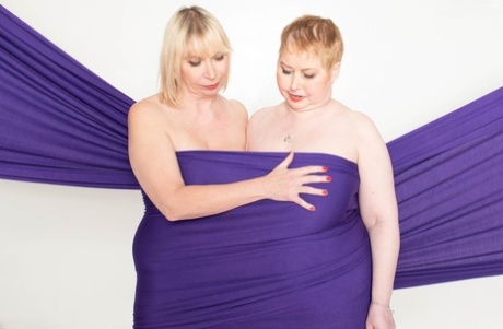 They are wrapped in fabric with a stretch of fabric that covers the arms and legs of fat amateur model Sophia and her naked partner.