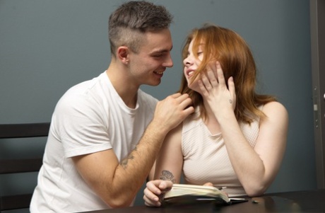 After fucking, Rebeca Fox, a barely legal redhead, is given an external blowjob.