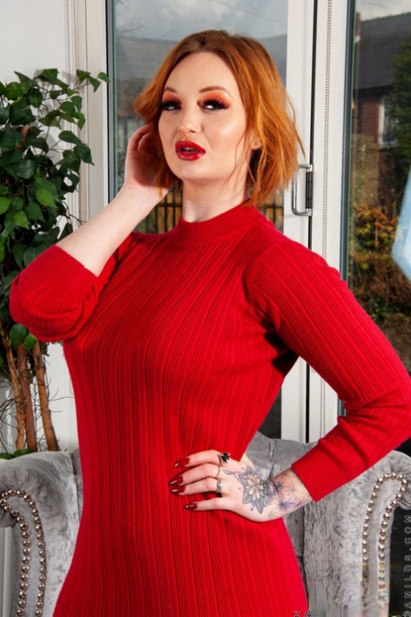 Busty redhead Zara Durose toys her trimmed pussy in sexy nylons