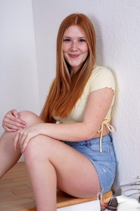 Young Redhead Harper Red Gets Naked On The Stairs While Wearing Sandals