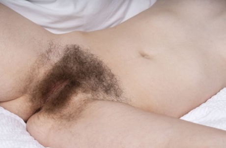 First Timer Ivy Addams Shows Her Hairy Underarms And Beaver Atop Her Bed