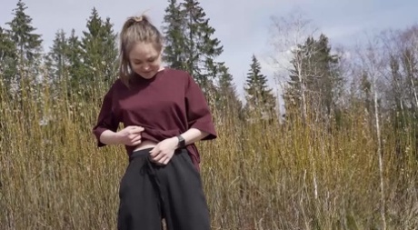 Fair Skinned Blonde Nastya Takes A Pee While Hiking In The Countryside
