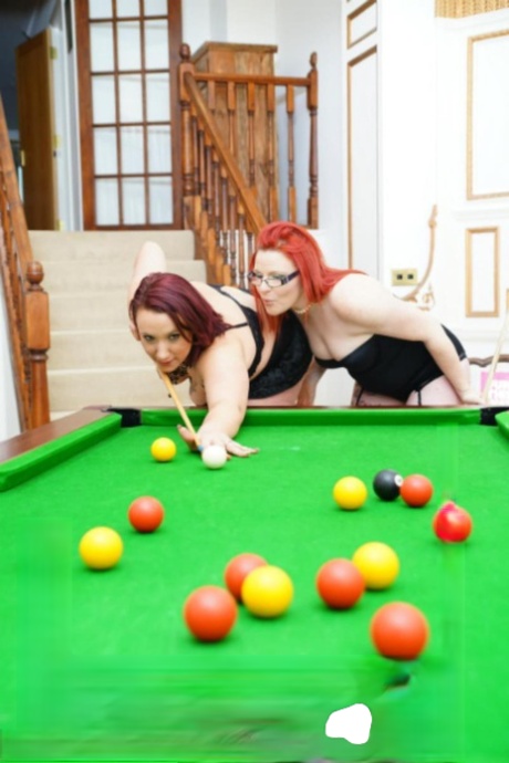 The lesbian girlfriend of amateur mobster Mollie Foxxx is seen posing in lingerie for the pool.