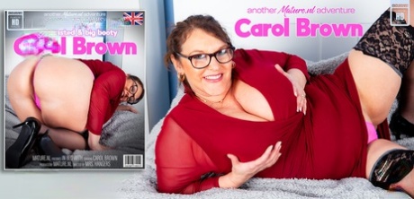 Big butt: Carol Brown reveals her huge breasts and big asteroids on a bed.