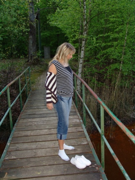 Middle-aged Blonde Sweet Susi Gets Bare Naked During A Walk Thru A Nature Park