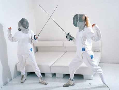 Mili Jay & Julie Silver, two female fencers competing in FFM, participate in the event after winning a duel.