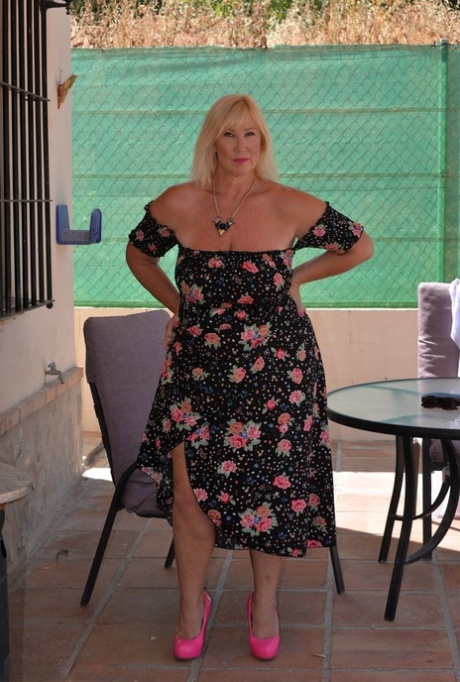 From a dress worn by an older blonde, Melody looses her large breastbone and fat buttocks.
