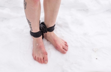 Adorned in the snow by her son Vika, photos from Barefoot, Bondage and Fetish villages.