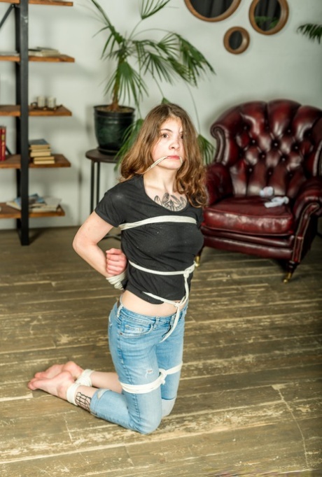 Vika posed while being tied up in different positions, which included photos of Bridgy toes, Bondage toes and tickling feet.
