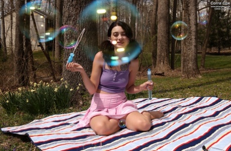Cute Brunette Corra Cox Blows Soap Bubbles Before Masturbating With Toys
