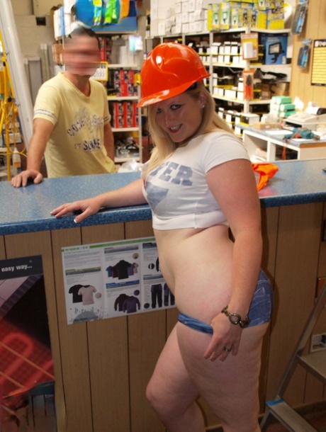 Samantha, a blonde and fat woman, is seen naked at a hardware store.