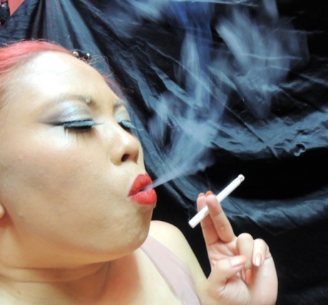 Sensual Smoking 001 is classified as Asian, Fetish, and Smoking.