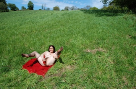 British Amateur Juicey Janey Dildos Her Bush On A Red Blanket In A Field