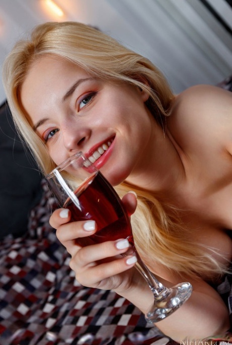 Beautiful Blonde Teen Bianca Bell Raises A Toast After Modelling In The Nude