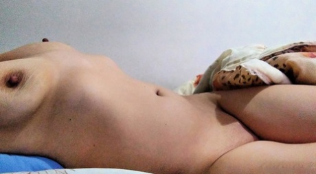 Chubby Asian Girl Jasmine Jade Licks Her Lips While Posing Nude By Herself