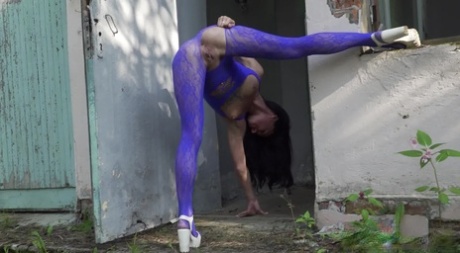 Flexible Brunette Gypsy Queen Takes A Piss Outside Of An Abandoned Building