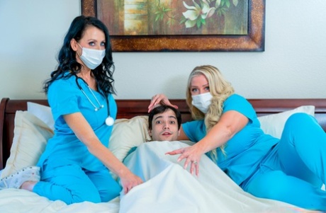 A young patient has a 3some with middle-aged nurses Reagan Foxx and Alura Jenson.