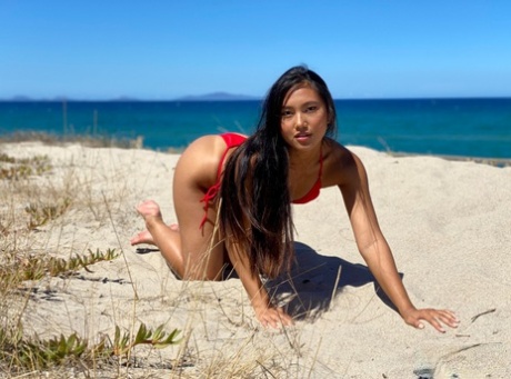 Brunette Teen May Thai Models Swimwear At The Beach Before A POV Blowjob