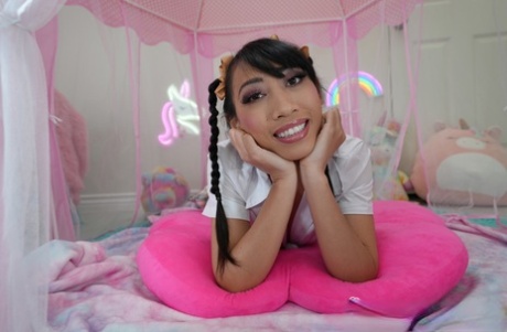 Asian Coed Salee Lee Sticks Out Her Tongue During Upskirt Action In Pigtails 70162451