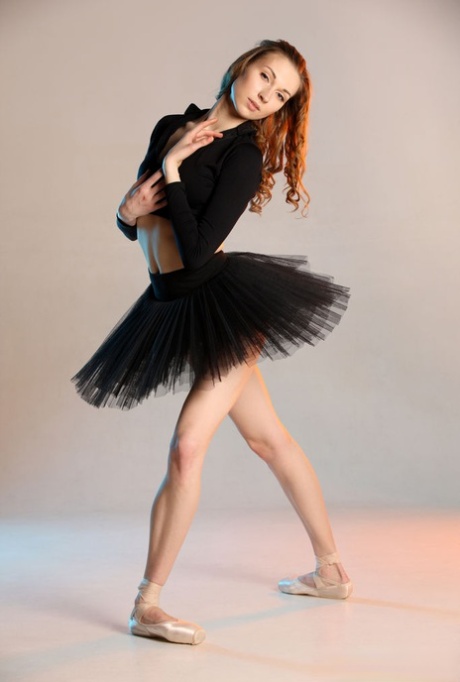 The nude display of 18-year old ballerina Annett A highlights her flexibility.