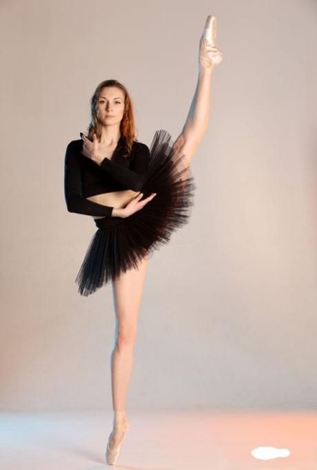 Annett A, an 18-year-old ballerina known for her flexibility, displays her body during a nude performance.