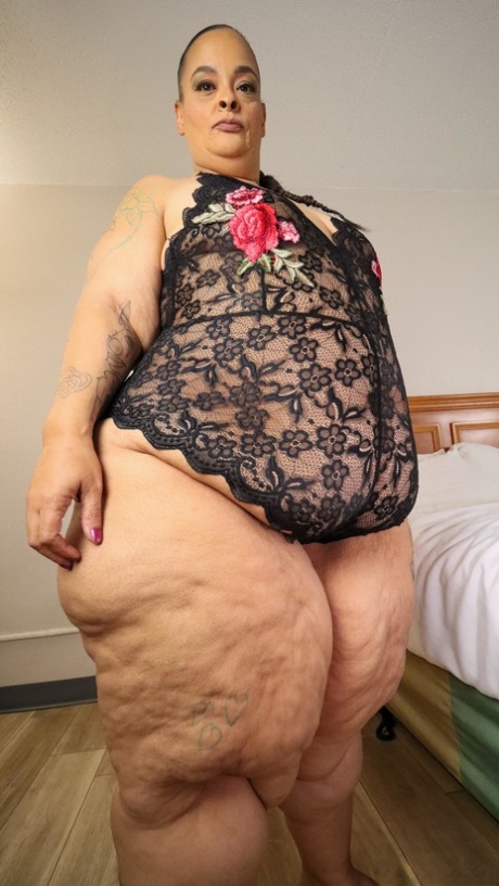SSBBW Strawberrys Delight Shows Her Massive Ass In Black Lingerie