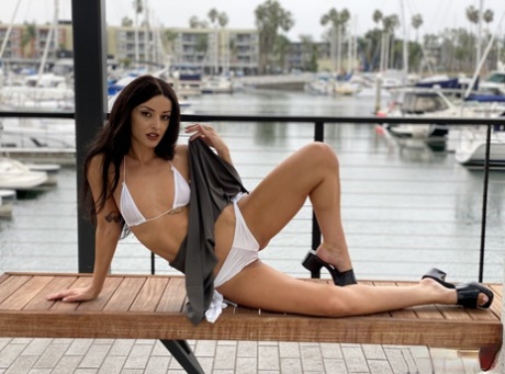 Tattooed Brunette Charlie Valentine Models A Bikini At A Marina Before POV Sex
