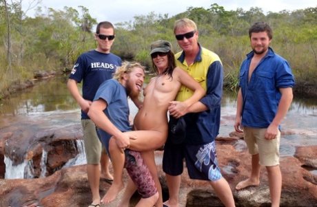 The naked girl, Roxeanne was groped by several men before she carried on with her beer.