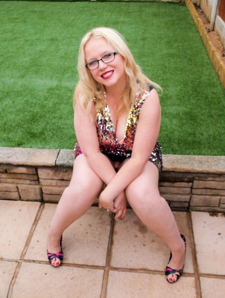 Overweight UK Blonde Sindy Bust Gets Naked On A Retaining Wall In A Backyard