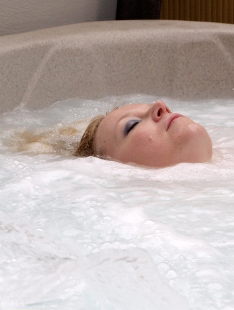 Overweight Blonde Sindy Bust Looses Her Huge Boobs In An Outdoor Hot Tub