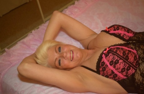 Mature Blonde Dimonty Slips Out Of Sexy Lingerie To Go Nude Atop Her Bed