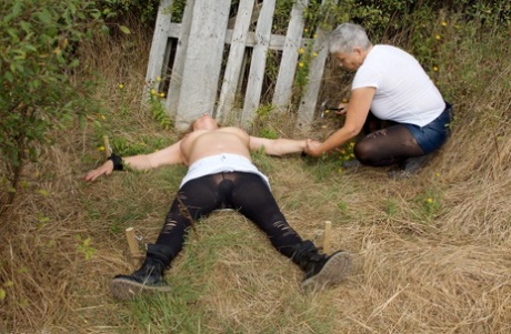 Old British Woman Restrains Busty Mature Lady Speedy Bee While In The Outdoors