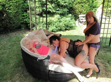 Older amateurs often have a lesbian threesome sitting on furniture in their backyards.