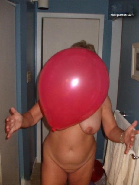 The older female character, Busty Bliss, plays with balloons in the bath before receiving a blowjob from point A.