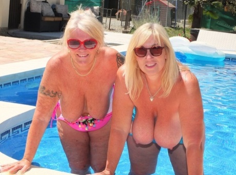 Lesbian sex in the pool is enjoyed by Melody and her girlfriend, who are both mature blonde and fat.