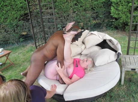 Overweight Women Participate In Interracial Group Sex In A Backyard