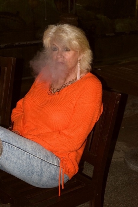 The photo depicts Dimonty, a young blonde who was wearing over the knee boots, at a hotel.