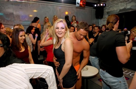 Clothed Females Give Male Strippers Blowjobs Inside A Club