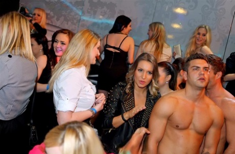 Clothed Females Give Male Strippers Blowjobs Inside A Club