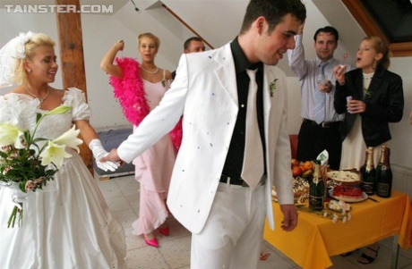 New Bride Dressed In Her Wedding Dress Plays Water Sport Games At Reception