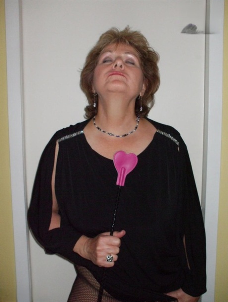 In POV, Busty Bliss, a plucky older woman, engages in sexual activity.