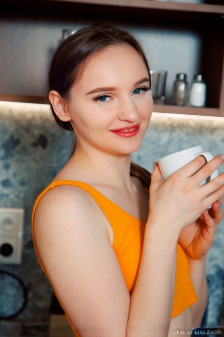 Sweet Teen Inka Gets Totally Naked Over A Cup Of Coffee In The Kitchen