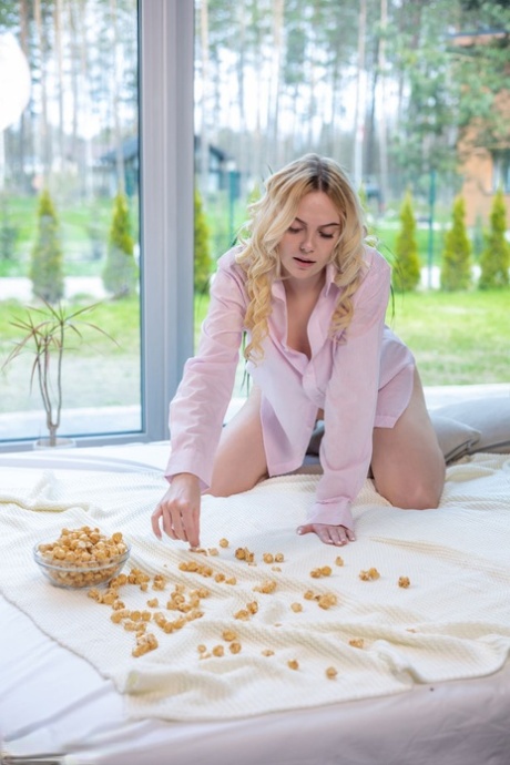 Beautiful Blonde Teen Adriana Gets Totally Naked While Snacking On Popcorn
